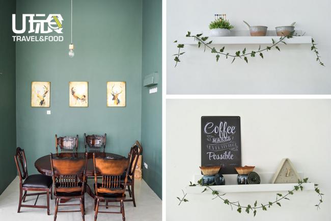咖啡馆以浅墨绿色搭配白色，墙壁上的小装饰让空间显得舒适简朴。