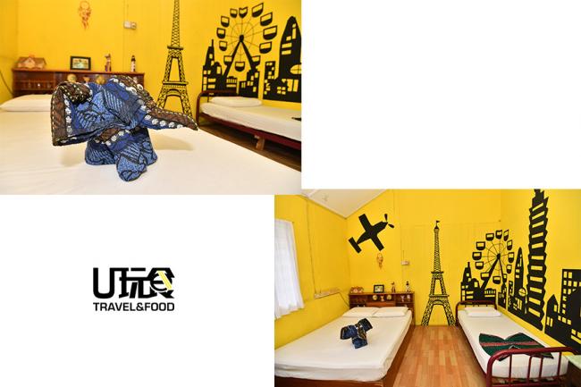 以城市剪影为主题的「黄色房间」，墙上绘画出许多象征性的建筑物，如巴黎铁塔、摩天轮及101大楼。