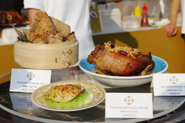 信和酒店的特色咸蛋黄金鸡槌、避风塘猪手和酿焗鲜蟹盖的粤式菜同样令人有无穷滋味。