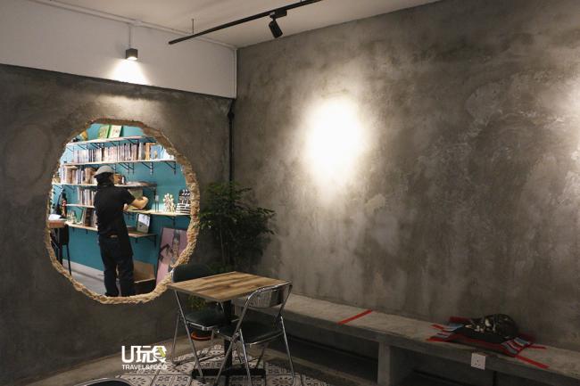 六艺咖啡馆内採用黑、白与绿为主题色，原先打算打掉的墙在游嘉雯的突发奇想之下变成了一个标志性的大洞，搭配灯光与石墙上的工业风更显个性。